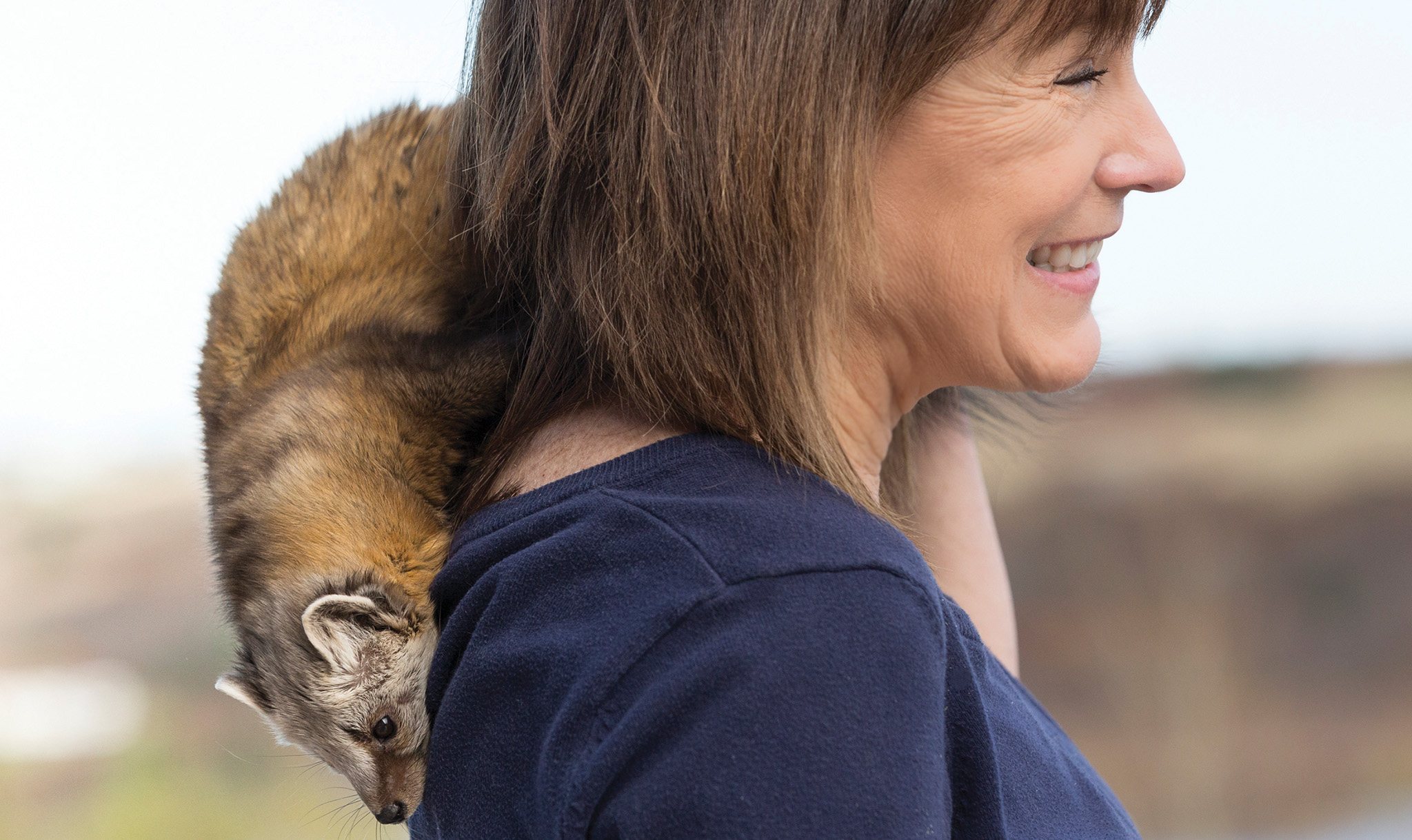 Hope Swinimer loves to help all animals. Here she is with Gretel the pine marten!