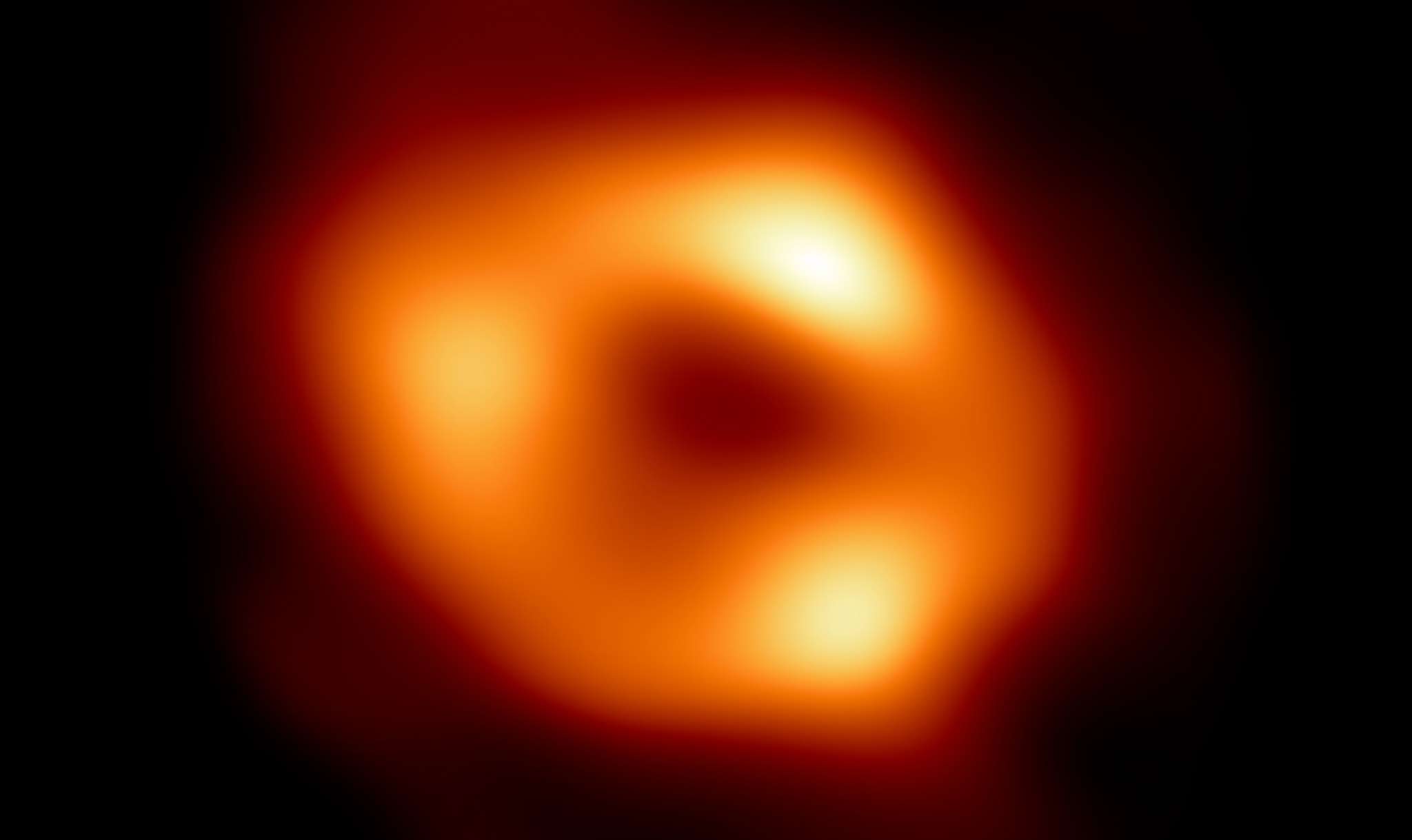 This is a REAL picture of a black hole. Scientists got the image in 2019.