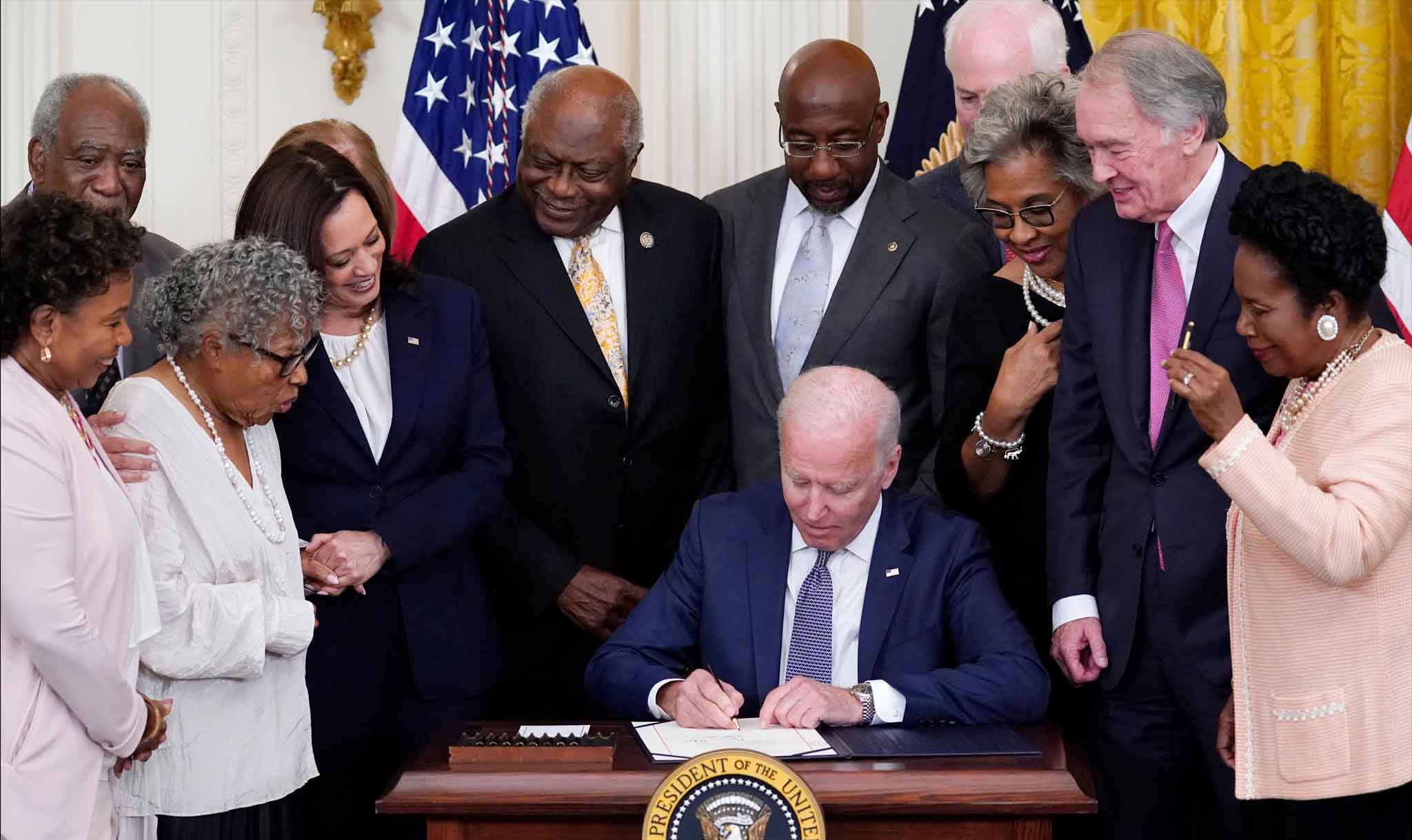 President Biden signs the bill making Juneteenth a holiday.