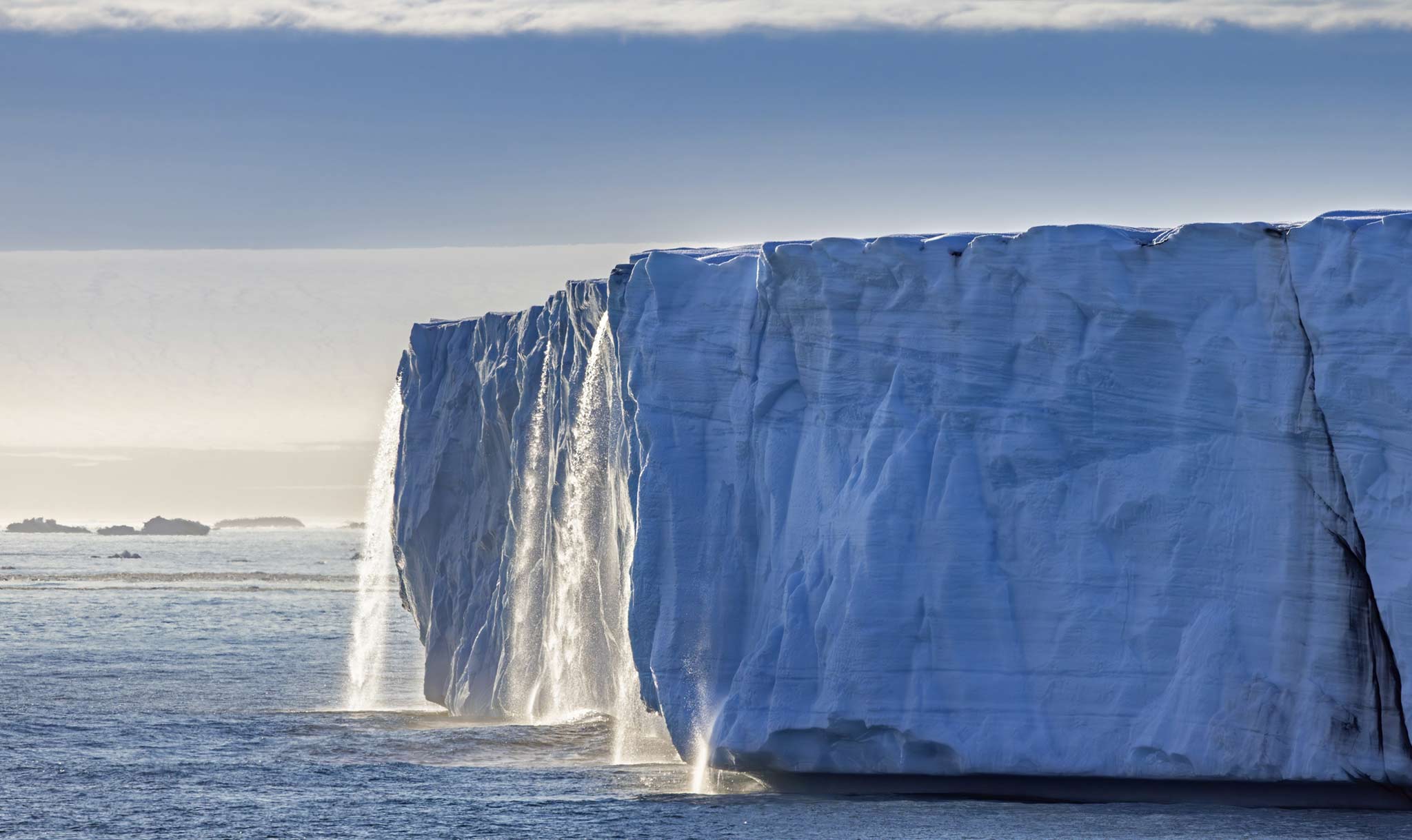 A melting glacier (Bråsvellbreen) in Norway creates a waterfall.