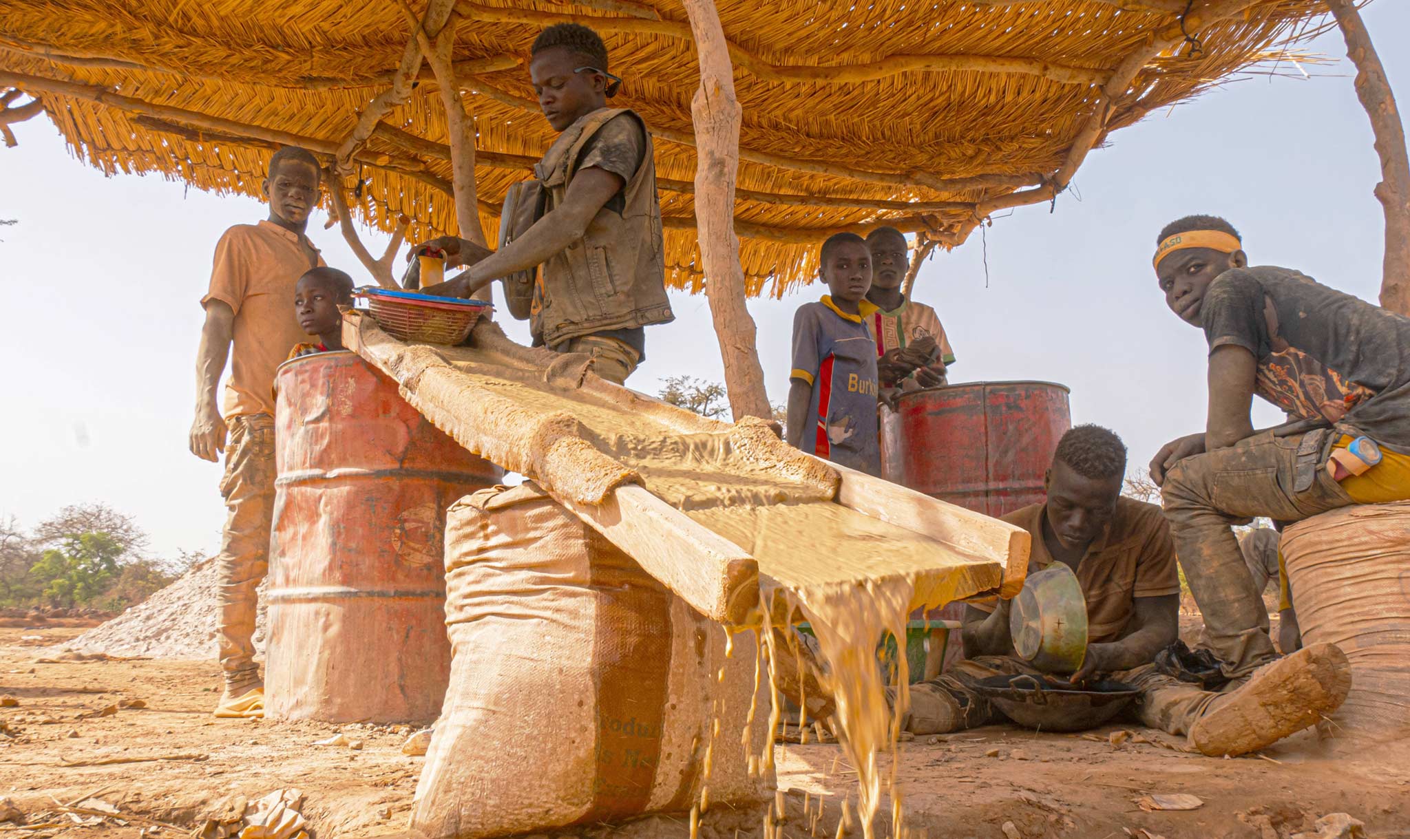 People pan for gold in Burkina Faso (Africa) in 2024.