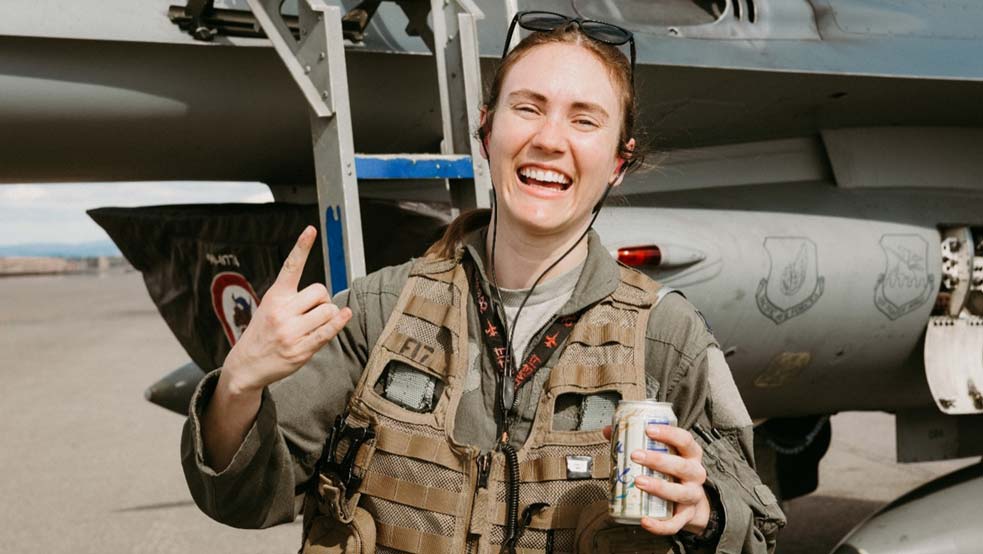 Brittany “Salsa” Dippel shares a smile outside her F-16!