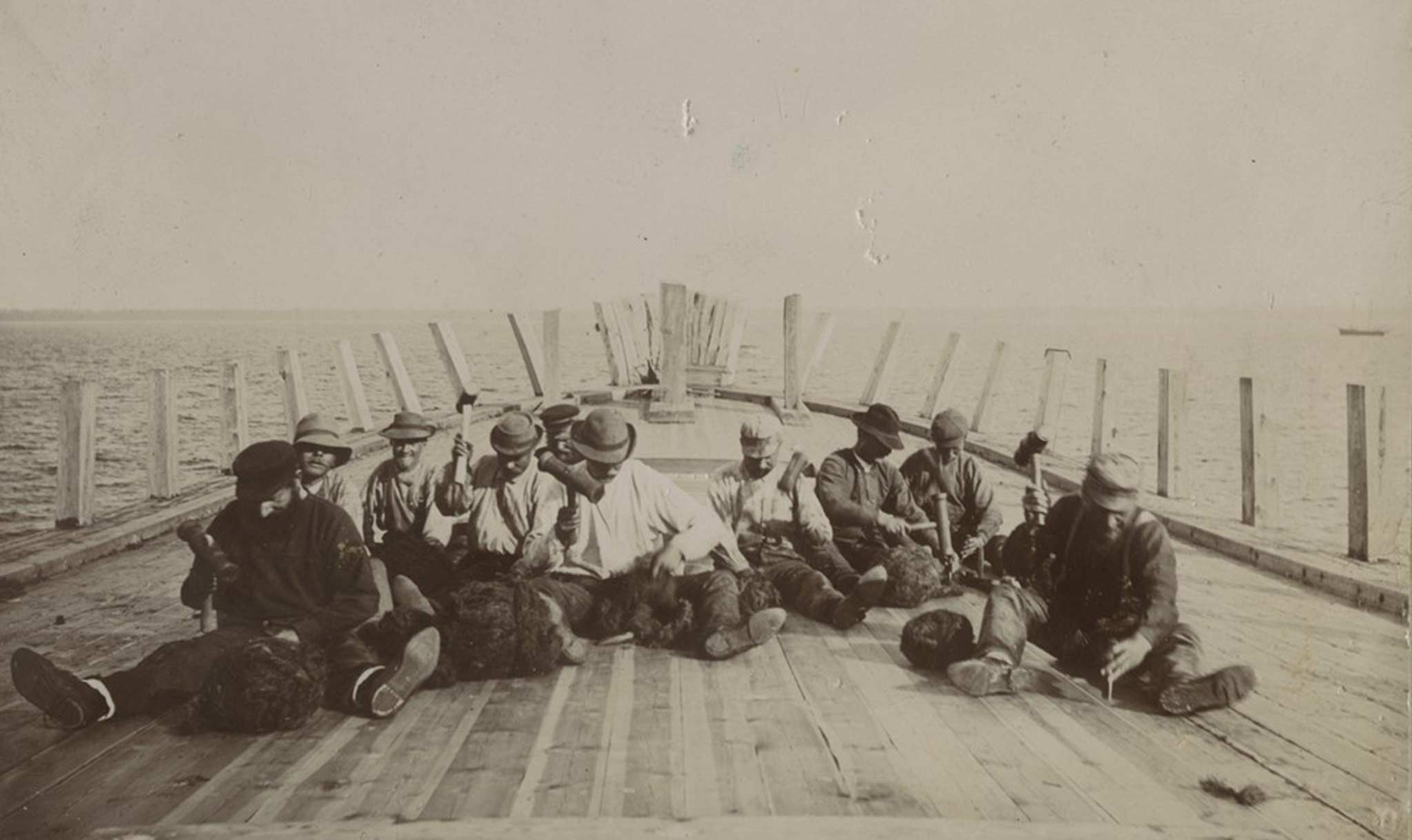 Caulkers fill the seams of boat planks.