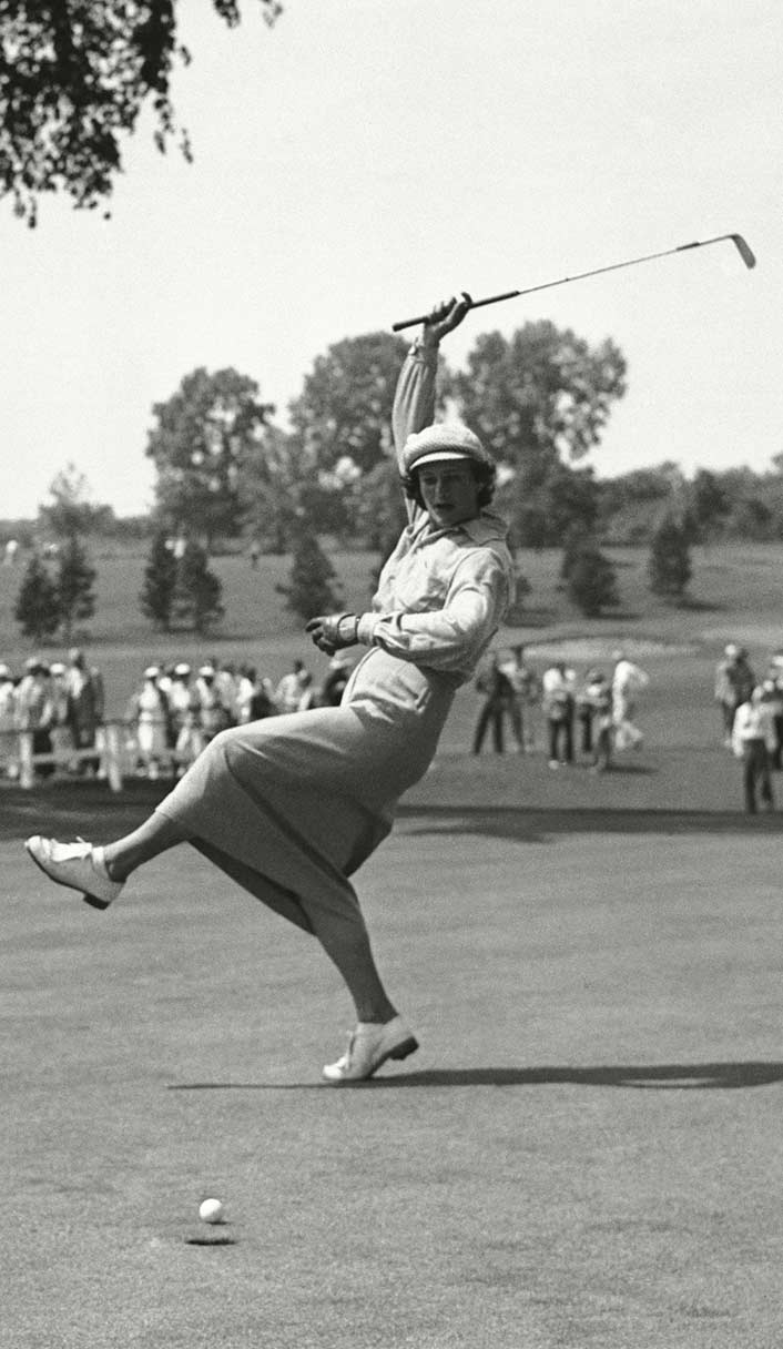 Zaharias urges her ball to go in the hole.