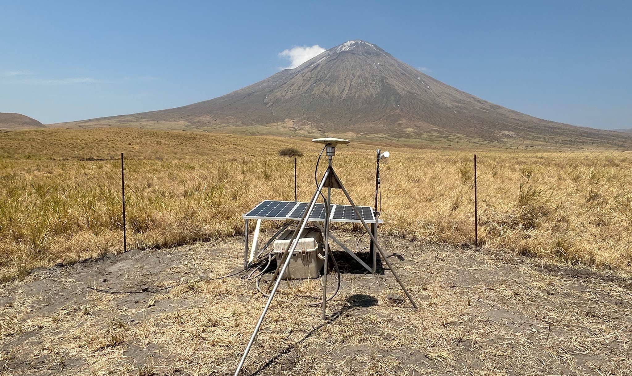 She helps communities study hazards like this volcano in Tanzania.