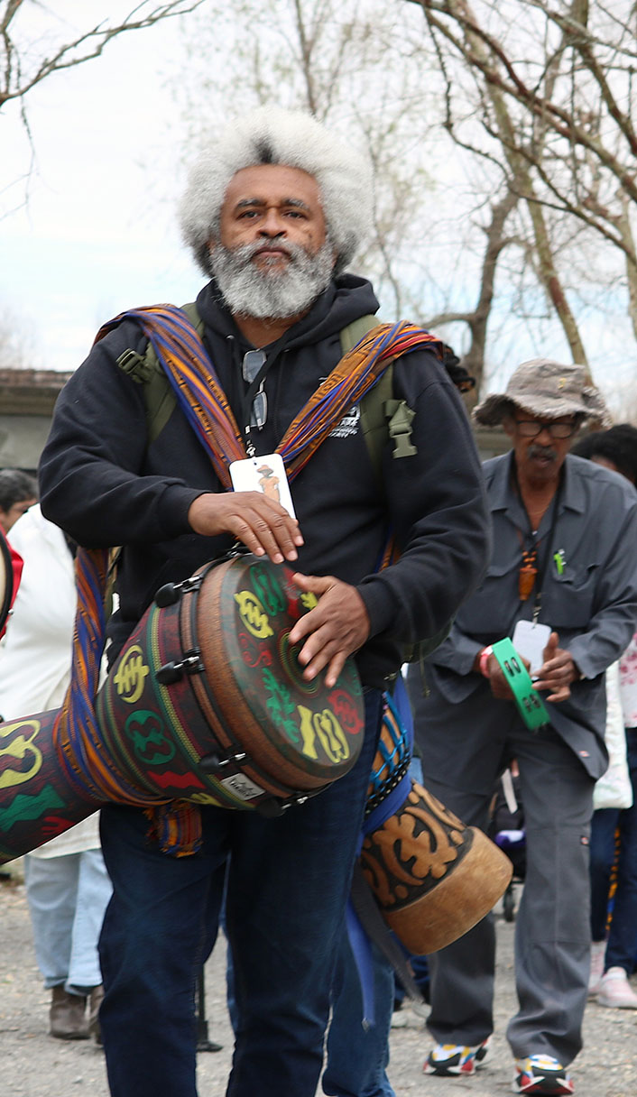 A drum circle leads a procession at the 2025 Blessing Ceremony.