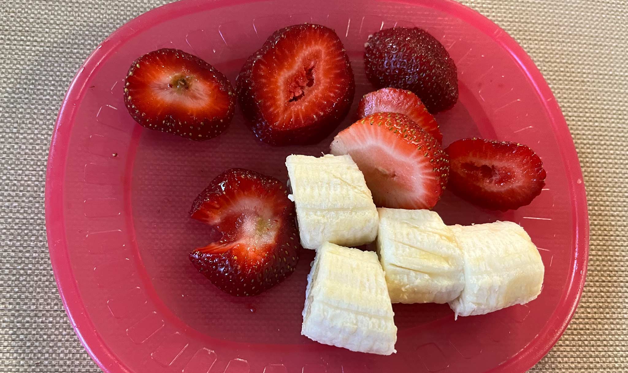 Wash and slice strawberries.