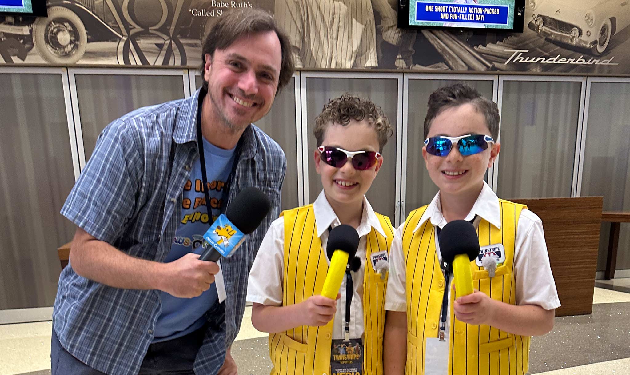 Russell Kahn with Twinstripe Reporters Carter (center) and Cooper (right)