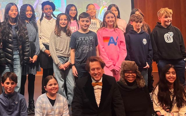 James Kennedy with young filmmakers at the 2025 festival.